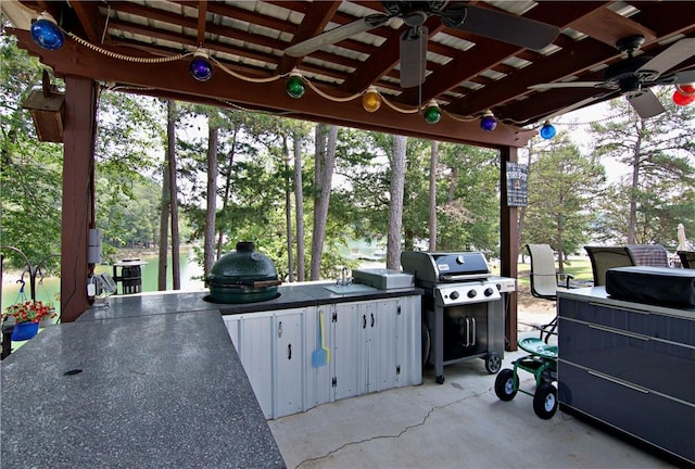 669 N Fleetwood Ln, Fair Play, SC 29643 - view of patio featuring a ceiling fan and view of scattered trees