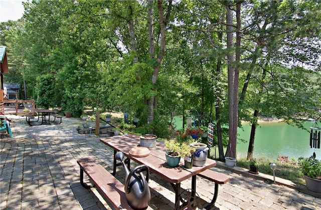 669 N Fleetwood Ln, Fair Play, SC 29643 - view of patio / terrace featuring a water view, a fire pit, and outdoor dining area