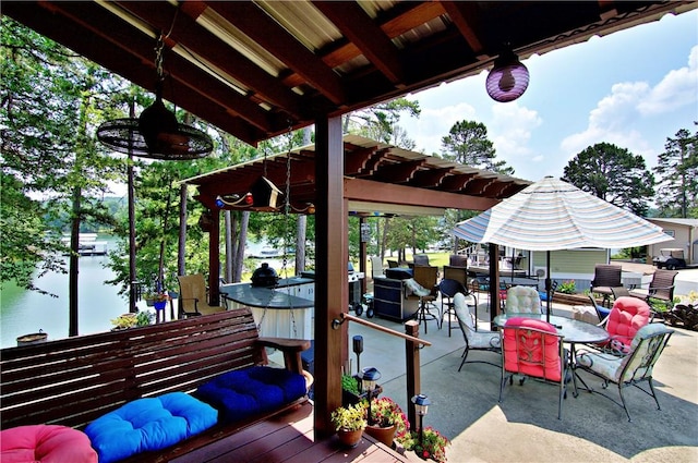 669 N Fleetwood Ln, Fair Play, SC 29643 - view of patio / terrace featuring outdoor dining area, a water view, and an outdoor hangout area