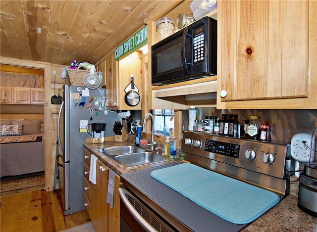 669 N Fleetwood Ln, Fair Play, SC 29643 - kitchen with stainless steel appliances, a sink, wood ceiling, and light wood-style flooring