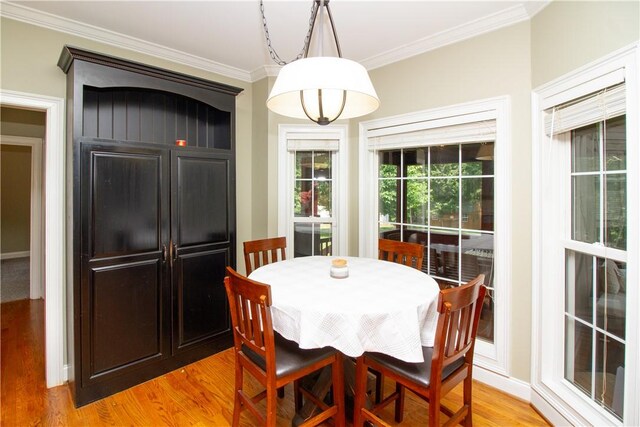 104 Tinsley Dr, Anderson, SC 29621 - dining space with light wood finished floors and ornamental molding