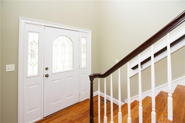 104 Tinsley Dr, Anderson, SC 29621 - entrance foyer featuring plenty of natural light, wood finished floors, stairs, and baseboards