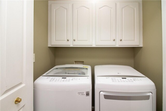 104 Tinsley Dr, Anderson, SC 29621 - washroom featuring cabinet space and washing machine and dryer