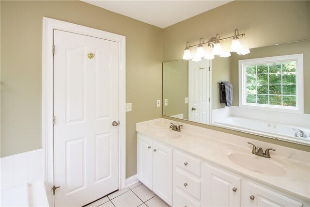 104 Tinsley Dr, Anderson, SC 29621 - bathroom with a bath, double vanity, and tile patterned flooring