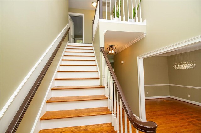 104 Tinsley Dr, Anderson, SC 29621 - stairway featuring wood finished floors, a towering ceiling, and ornamental molding