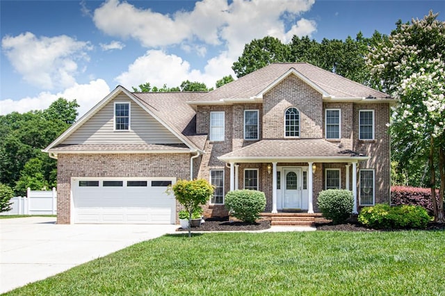 104 Tinsley Dr, Anderson, SC 29621 - view of front of home with concrete driveway, brick siding, and roof with shingles
