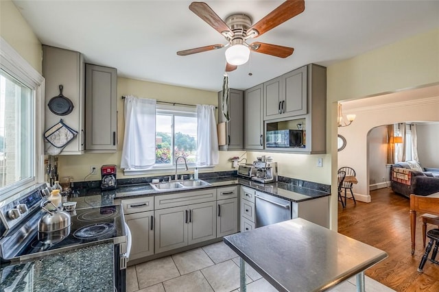6913 White Horse Rd, Greenville, SC 29611 - kitchen featuring a sink, appliances with stainless steel finishes, gray cabinets, dark countertops, and ceiling fan