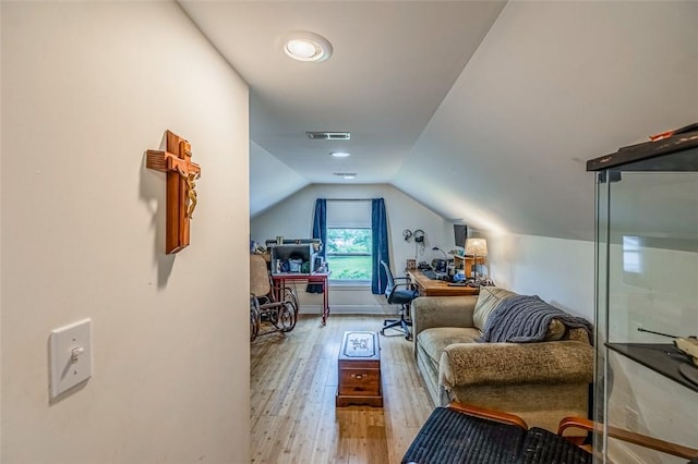 6913 White Horse Rd, Greenville, SC 29611 - bedroom with a desk, vaulted ceiling, wood finished floors, and baseboards