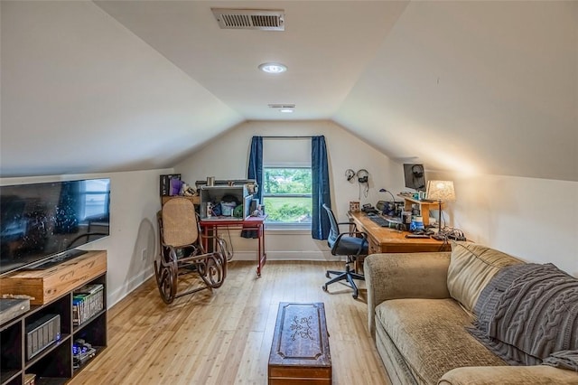 6913 White Horse Rd, Greenville, SC 29611 - home office with light wood-style floors, lofted ceiling, and baseboards