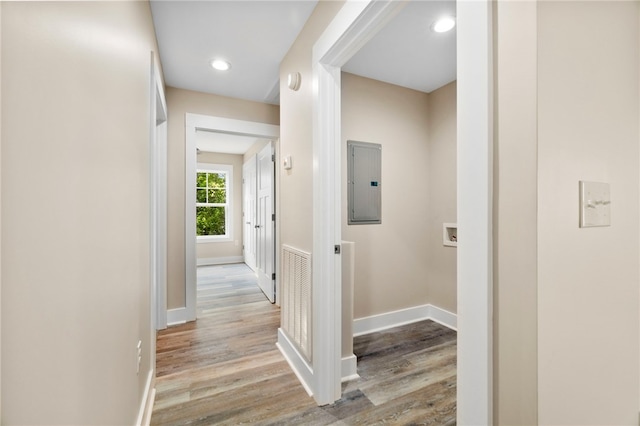 1205 W Franklin St, Anderson, SC 29624 - hall with electric panel, wood finished floors, baseboards, and recessed lighting