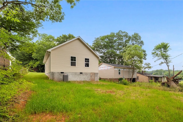 1205 W Franklin St, Anderson, SC 29624 - rear view of property featuring crawl space and central air condition unit