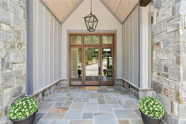 221 Hermitage Dr, Six Mile, SC 29682 - doorway to property featuring stone siding, french doors, and board and batten siding