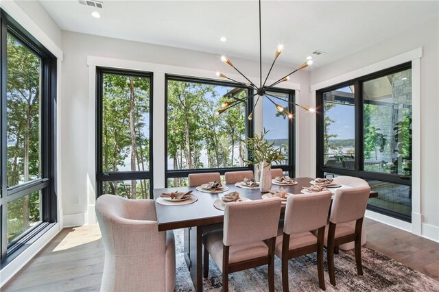 221 Hermitage Dr, Six Mile, SC 29682 - dining area featuring a chandelier, plenty of natural light, wood finished floors, and recessed lighting