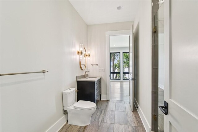 221 Hermitage Dr, Six Mile, SC 29682 - bathroom with vanity, toilet, and baseboards