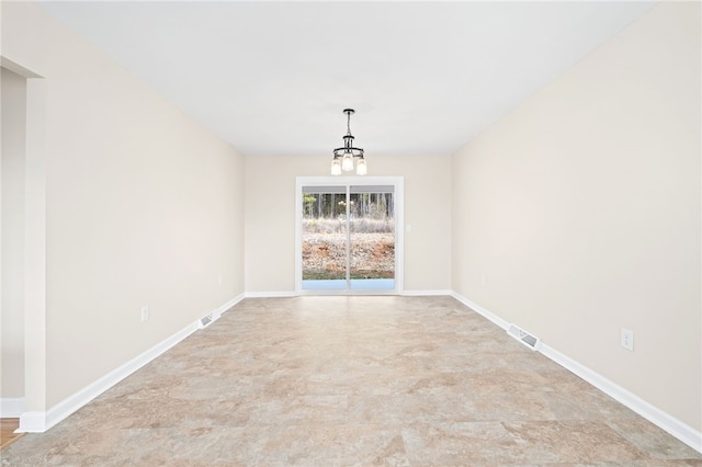 509 Old Clemson Hwy, Seneca, SC 29672 - empty room with a chandelier and baseboards
