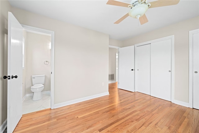 509 Old Clemson Hwy, Seneca, SC 29672 - unfurnished bedroom featuring light wood-style flooring, ensuite bath, baseboards, and ceiling fan