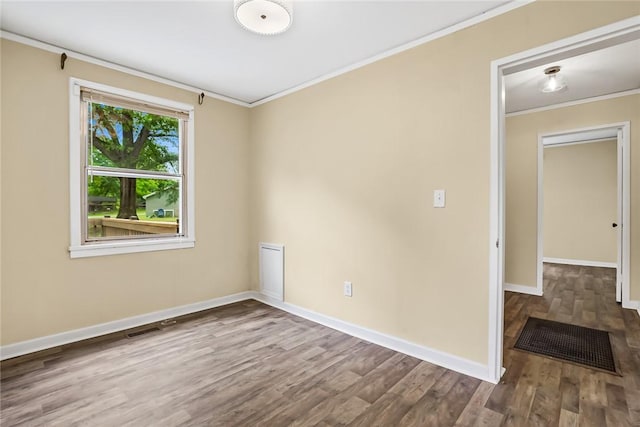 710 Greenville St, Pendleton, SC 29670 - empty room with crown molding, wood finished floors, and baseboards