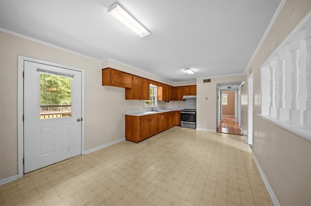 100 Colonial Ct, West Union, SC 29696 - kitchen with stainless steel stove, light countertops, baseboards, range hood, and light flooring