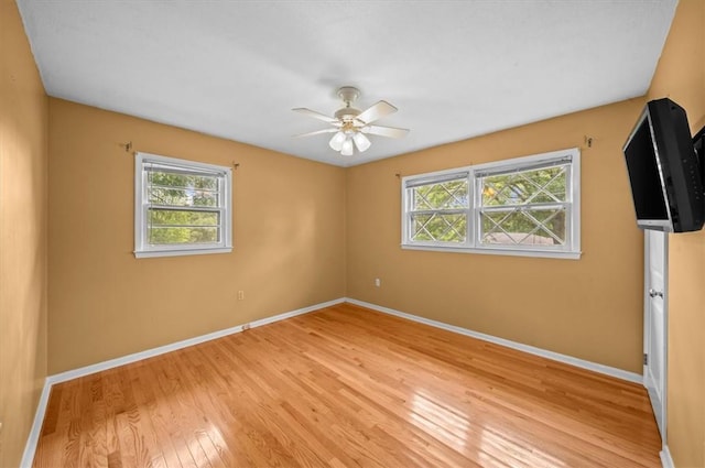 100 Colonial Ct, West Union, SC 29696 - spare room featuring light wood-type flooring, baseboards, and ceiling fan