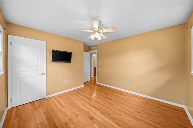 100 Colonial Ct, West Union, SC 29696 - unfurnished bedroom featuring baseboards, light wood-type flooring, and a ceiling fan