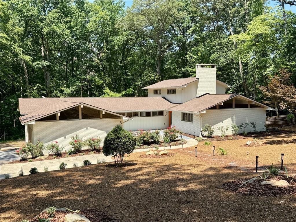 333 Woodland Way, Clemson, SC 29631 - view of front of property with a chimney and roof with shingles