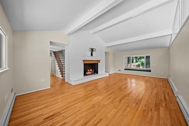 333 Woodland Way, Clemson, SC 29631 - unfurnished living room featuring baseboard heating, light wood-style floors, and a fireplace