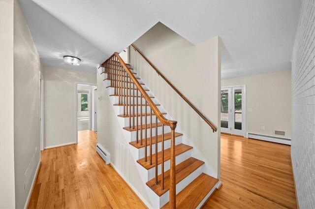 333 Woodland Way, Clemson, SC 29631 - staircase featuring baseboard heating and wood finished floors