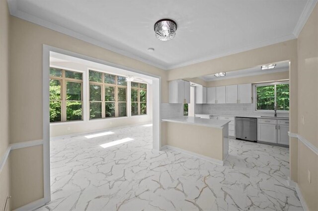 333 Woodland Way, Clemson, SC 29631 - kitchen with dishwasher, crown molding, light marble finish floors, light countertops, and a peninsula