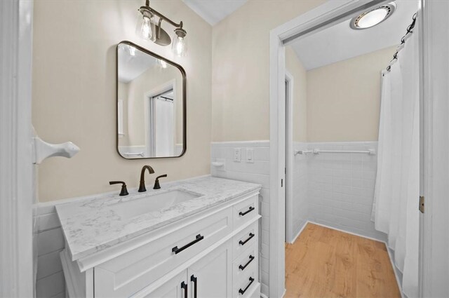 333 Woodland Way, Clemson, SC 29631 - full bathroom with tile walls, vanity, a wainscoted wall, and wood finished floors