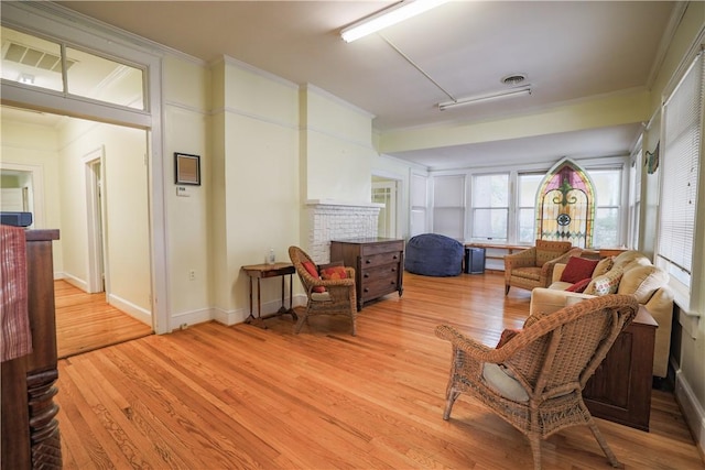 206 W N 1st St, Seneca, SC 29678 - living area with light wood-type flooring and crown molding