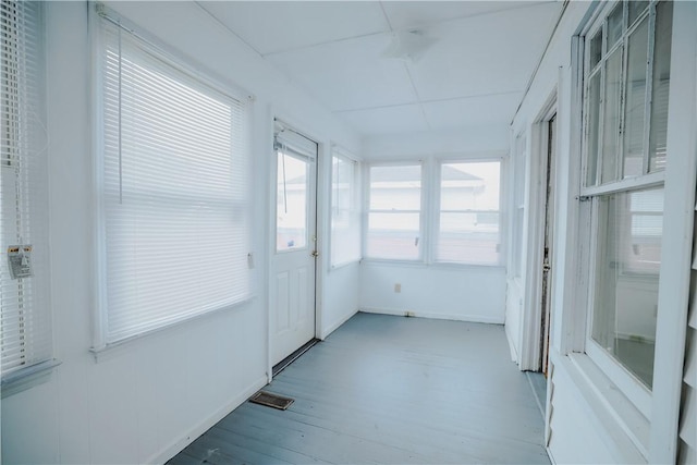 206 W N 1st St, Seneca, SC 29678 - unfurnished sunroom with wood finished floors and baseboards