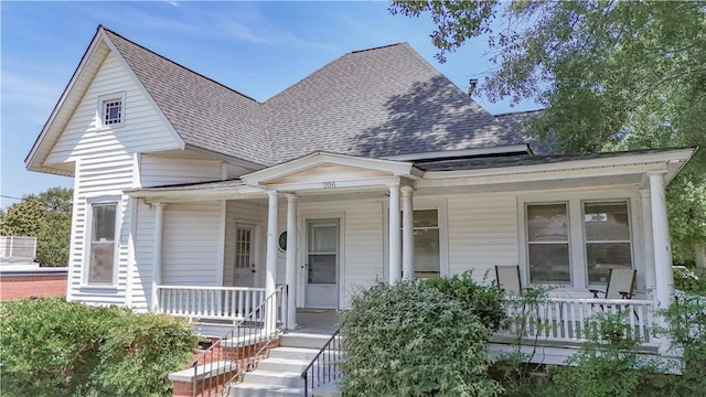 206 W N 1st St, Seneca, SC 29678 - view of front facade featuring covered porch and roof with shingles