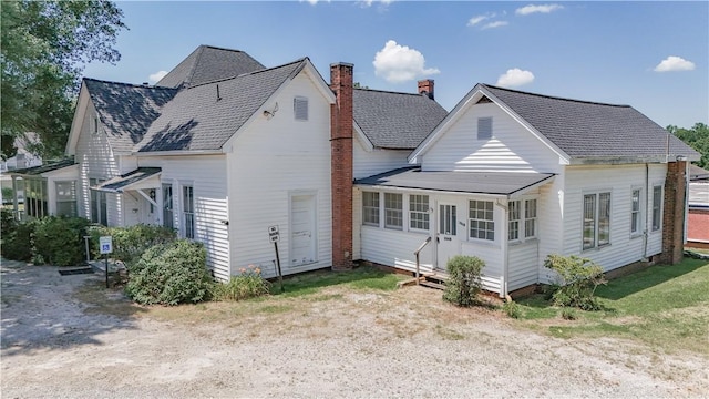 206 W N 1st St, Seneca, SC 29678 - rear view of property with entry steps, a chimney, and a shingled roof