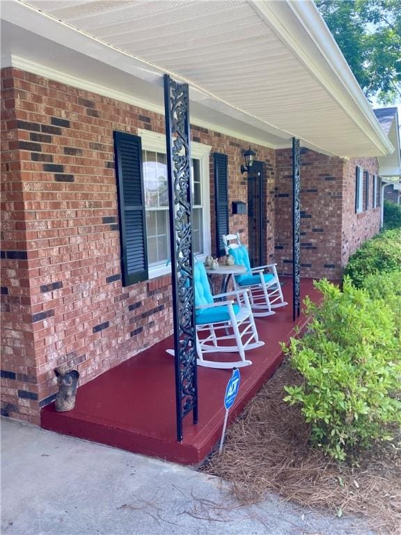 7 Carlisle Dr, Honea Path, SC 29654 - view of exterior entry featuring a porch and brick siding