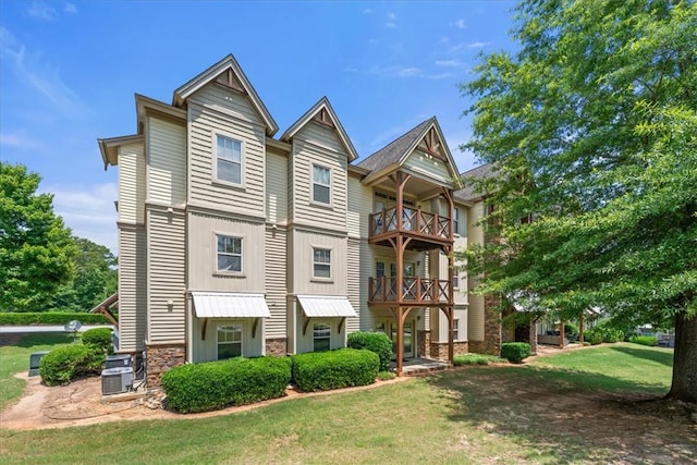 1814 Muscovy Way, Seneca, SC 29678 - view of front facade with stone siding, a front lawn, and central AC