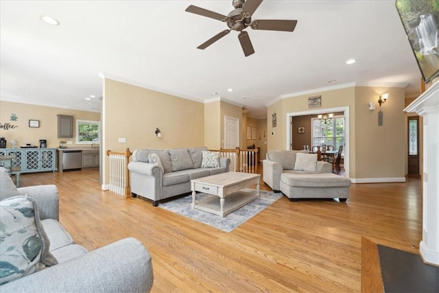 149 Summers Way, Seneca, SC 29672 - living area featuring light wood-type flooring, a ceiling fan, plenty of natural light, ornamental molding, and recessed lighting