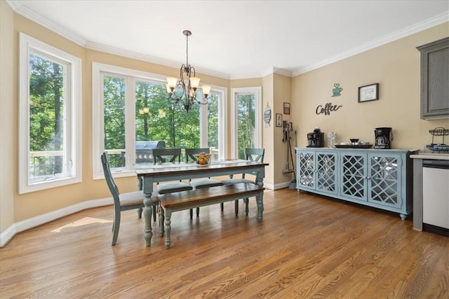149 Summers Way, Seneca, SC 29672 - dining space featuring plenty of natural light, baseboards, light wood finished floors, ornamental molding, and a chandelier