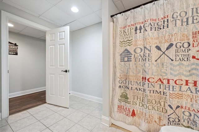 149 Summers Way, Seneca, SC 29672 - bathroom with a paneled ceiling, tile patterned floors, baseboards, toilet, and a shower with shower curtain