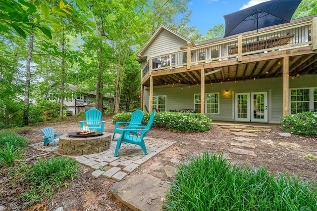 149 Summers Way, Seneca, SC 29672 - back of house with a fire pit, a wooden deck, french doors, and a patio