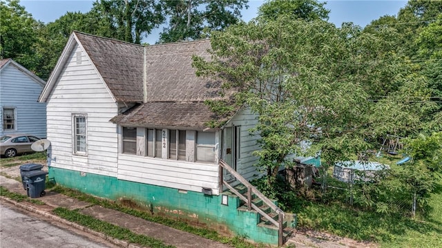 209 A St, Anderson, SC 29625 - view of front of home with a shingled roof and crawl space