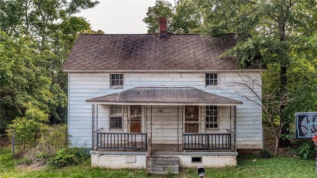 209 A St, Anderson, SC 29625 - view of front of property featuring a porch, a shingled roof, and a chimney