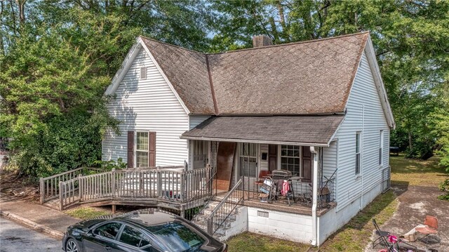 209 A St, Anderson, SC 29625 - view of front facade with a chimney, roof with shingles, a porch, and stairway