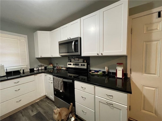 650 Marcengill Rd, Westminster, SC 29693 - kitchen with appliances with stainless steel finishes, white cabinetry, and dark countertops