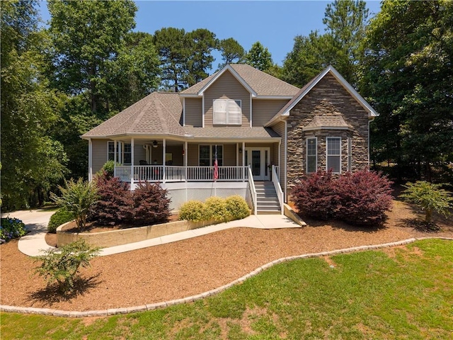 606 Lighthouse Ct, Seneca, SC 29672 - view of front of home featuring a porch, stone siding, and stairs