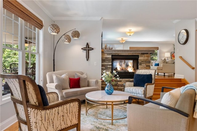 606 Lighthouse Ct, Seneca, SC 29672 - living area featuring crown molding, wood finished floors, a stone fireplace, and baseboards