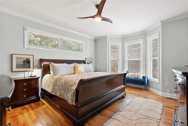 606 Lighthouse Ct, Seneca, SC 29672 - bedroom featuring multiple windows, light wood-style flooring, baseboards, crown molding, and ceiling fan