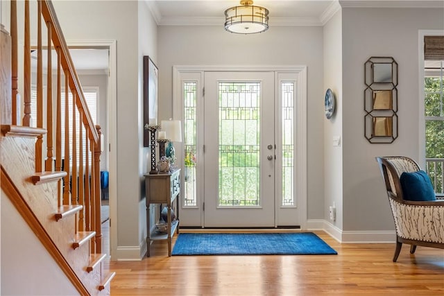 606 Lighthouse Ct, Seneca, SC 29672 - foyer featuring wood finished floors, ornamental molding, baseboards, and stairway