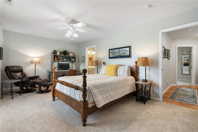 606 Lighthouse Ct, Seneca, SC 29672 - bedroom with carpet floors, baseboards, ensuite bath, and a ceiling fan