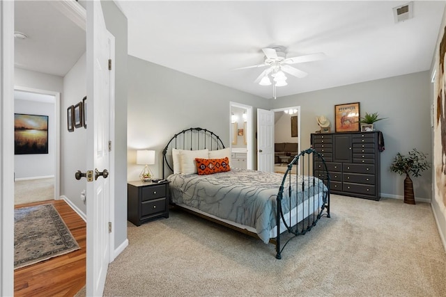 606 Lighthouse Ct, Seneca, SC 29672 - carpeted bedroom featuring baseboards, ensuite bath, and a ceiling fan