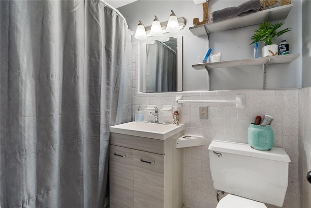 304 Samuel Rd, Honea Path, SC 29654 - full bath with vanity, toilet, tile walls, and a shower with shower curtain